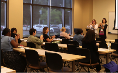 Dr. Desiree Murray and Dr. Beverly Rudolph led participants in a simple five-finger breath exercise designed to develop mindfulness and achieve a calm natural breath rhythm. 